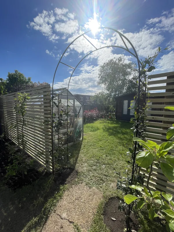 Slatted garden screening and arch